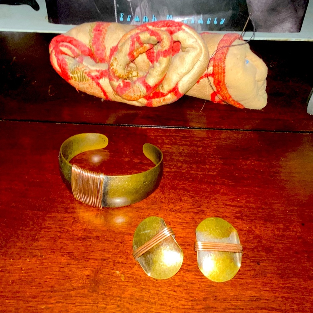 Matching set of Copper bracelet and earrings .